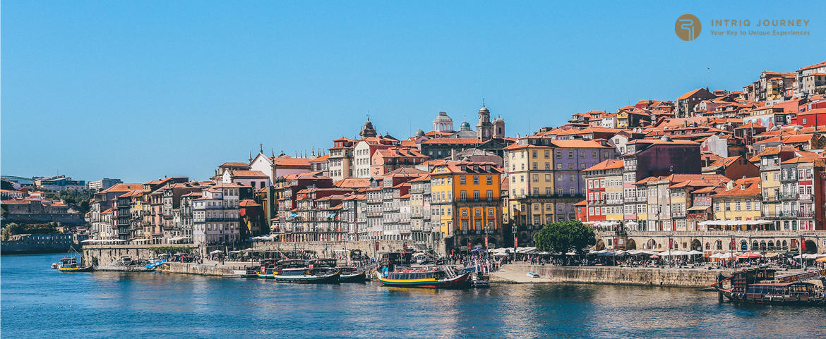 Colorful Ribeira waterfront in Porto, Portugal’s luxury riverside escape.
