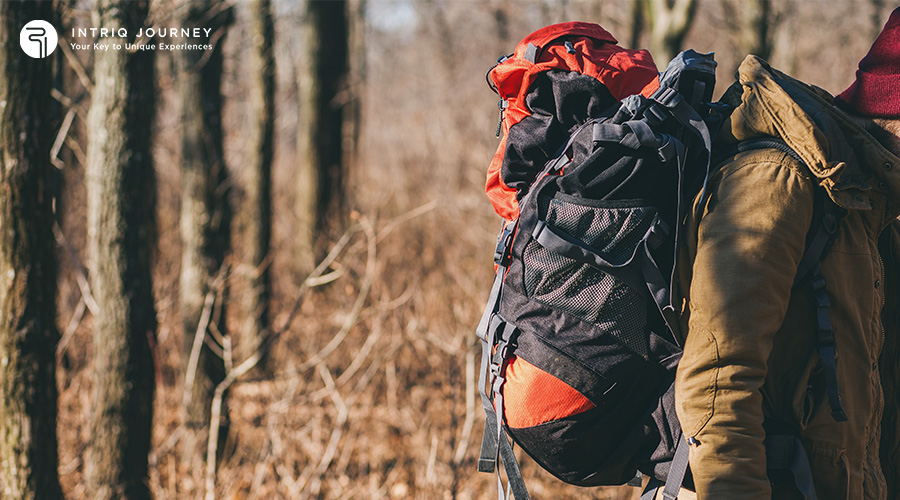 A close-up of a well-packed, heavy-duty hiking backpack