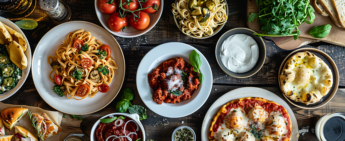 Gourmet spread of authentic Italian pasta and pizza dishes.