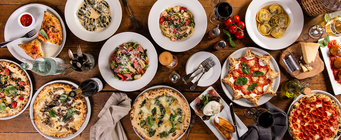 Variety of traditional Italian pasta and pizza for gourmet dining.